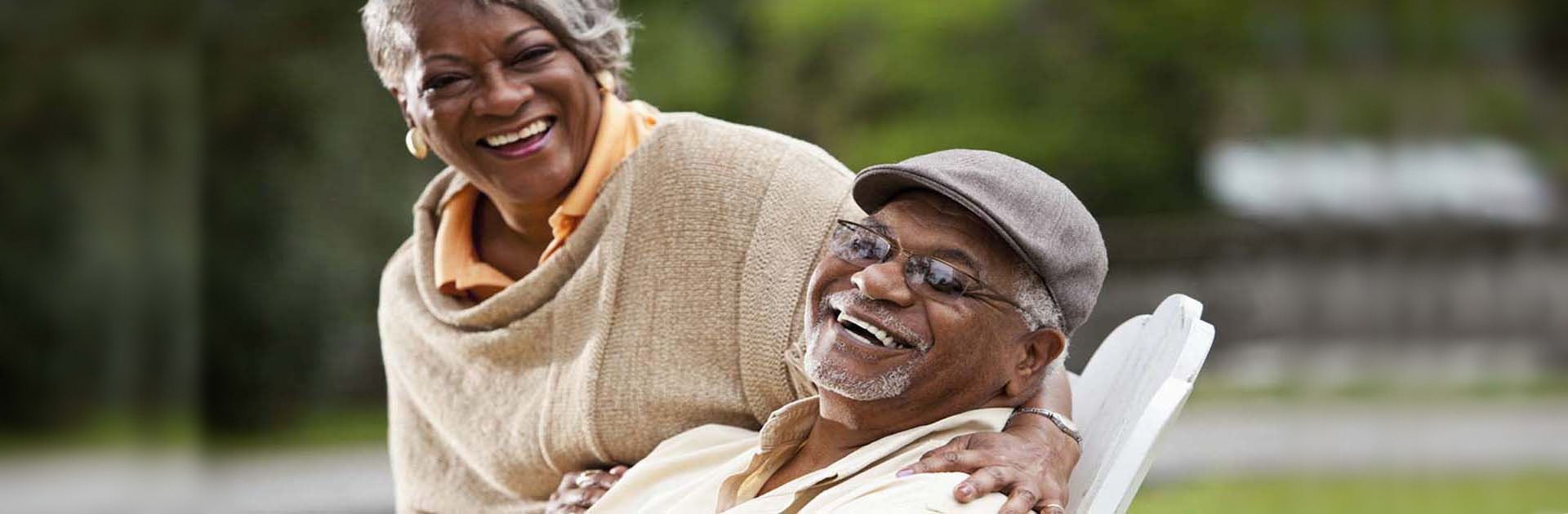 Older Black Couple Smiling With Each Other